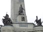 Several sculptures surrounding the outside of the memorial structure depict scenes from Lincoln's adult life